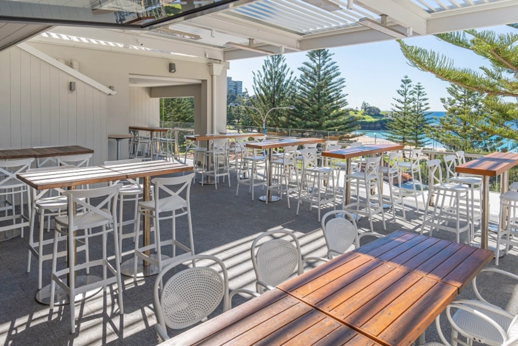 Airy, light spaces to have a drink and a bite at Coogee legion Club top floor overlooking Coogee Beach